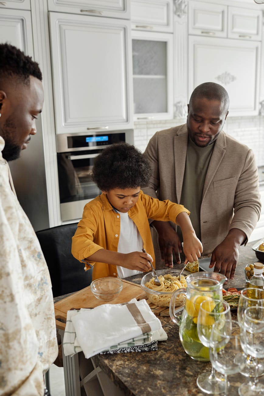 Family cooking together in a kitchen